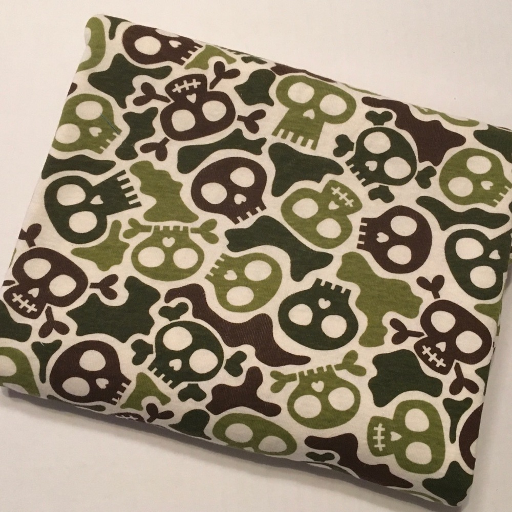 Skull stretch knit green & brown fabric